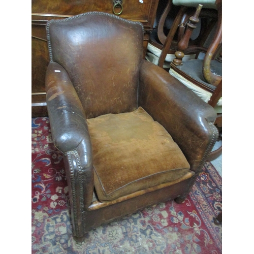 An early 20th century leather upholstered stud back armchair
Location: G