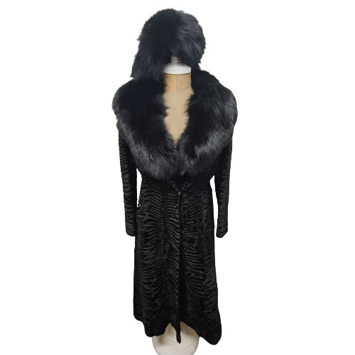 An Alan Fischelis black shearling and rabbit hair three-quarter length coat, UK size 10/12 having an embroidered lining together with an Elizabeth Comber & Co black rabbit hat with oversized pom-pom
Condition: Some wear and tear to the front fastening area-see photos
Location: Rail