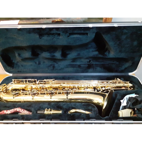 A Howarth Chiltern saxophone 8810BR, gold lacquer with accessories in a fitted case.
Location: 1:5