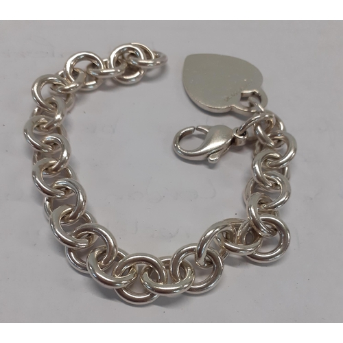 15 - Tiffany-A vintage silver open chain bracelet with heart pendant, 34.6g
Location: CAB