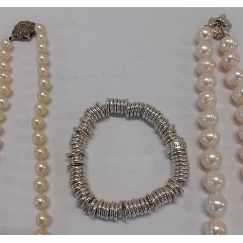 16 - Links of London-A silver multi ring bracelet, 50.3g together with two pearl necklaces
Location: CAB