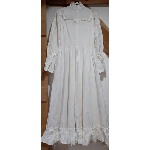 23 - Vintage Laura Ashley ivory cotton full length and long sleeved dress with high collar, full skirt an... 