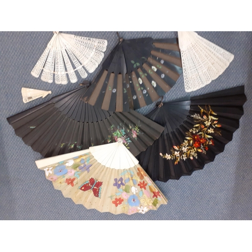 32 - Seven late 19th/early 20th Century fans, 3 hand-painted and one embroidered together with one fan bo... 