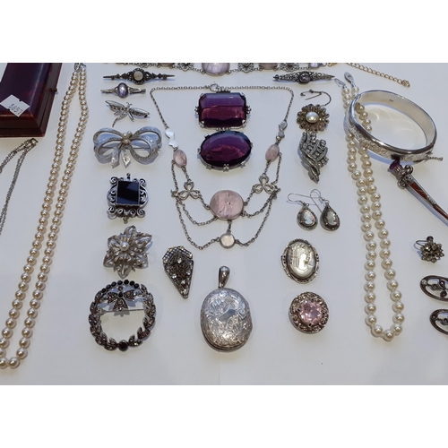 36 - Sterling silver and silver coloured costume jewellery with purple stones to include a Sterling silve... 