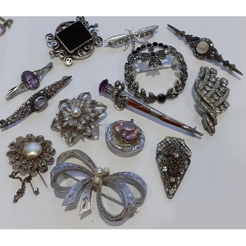 36 - Sterling silver and silver coloured costume jewellery with purple stones to include a Sterling silve... 
