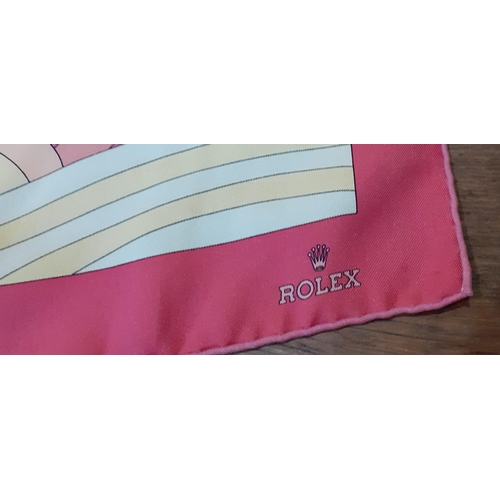 55 - Rolex- A late 20th Century silk scarf in a pink, peach and yellow colour-way with images of the Role... 