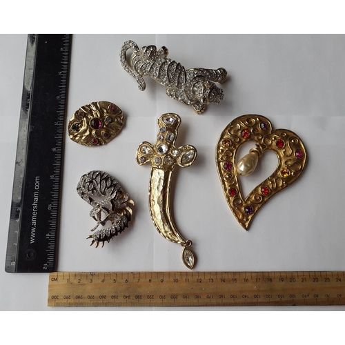 49 - Eight late 20th century oversized and contemporary gold tone fashion brooches to include an Attwood ... 