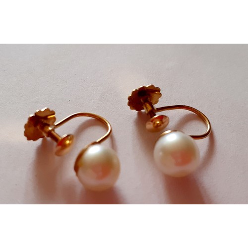 30 - A pair of 14 carat gold and pearl clip on earrings, total weight 1.6g together with a small 9 carat ... 