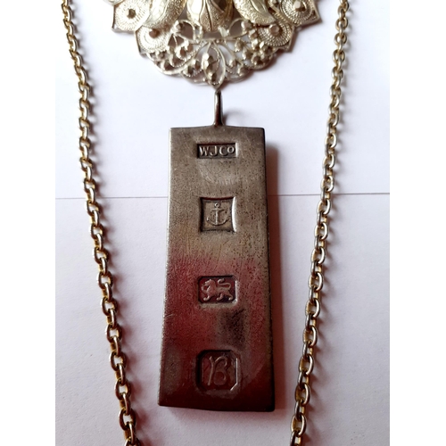 15 - A silver ingot together with silver and white metal costume jewellery to include a pair of hoop earr... 