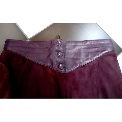 18 - Louis Feraud- A 1980's 2 piece ladies trouser outfit in an aubergine coloured suede with aubergine l... 