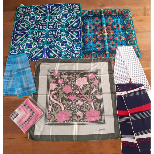 25 - A group of 1970's silk scarves to include Laura E. Martin, Bellino, Ostinelli, Georgina Richmond and... 