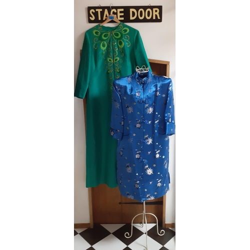 28 - A Chinese machine made kimono style blue silk gown with mandarin collar, 40