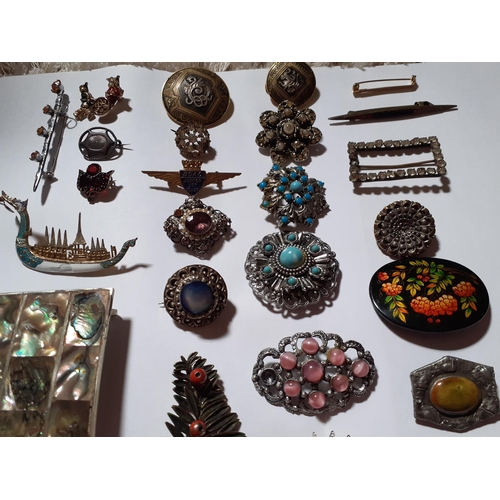 35 - Vintage brooches to include silver examples, a Siam Sterling silver gilt and enamelled brooch ion th... 