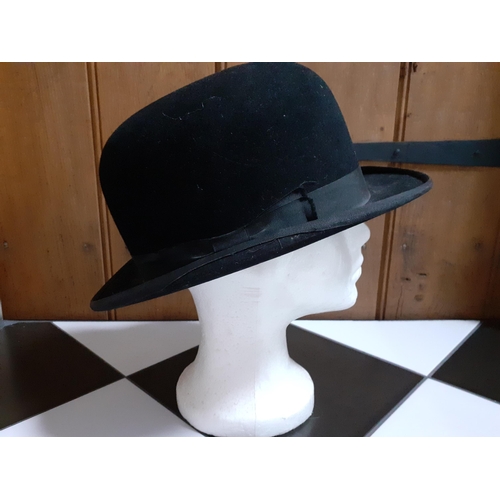 39 - Two Major Wear 'Deadman Dressage' 100% wool, formal hats in black with feather adornment and pillar ... 