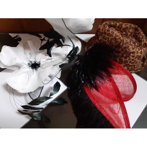 40 - Three modern fascinators to include the milliners Laurence Leleux and Mad Hatter together with a mod... 