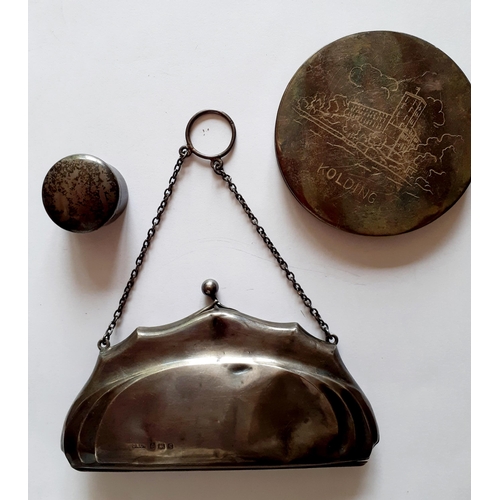 43 - An early 20th Century silver bag with metal chain together with a white metal engraved compact and a... 
