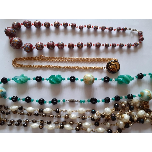 46 - Vintage jewellery to include a Venetian glass bead necklace and a 22ct gold plated locket on chain. ... 