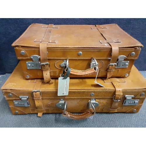 51 - Two 1970's tan leather suitcase of small proportions, 67cm and 47cm wide
Location: RAB