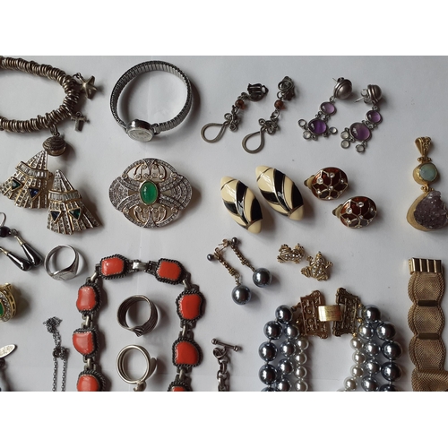 59 - Mixed 20th century costume jewellery to include a vintage Scooter, Paris orange and brushed silver c... 