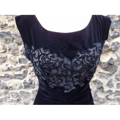 9 - Norman Hartnell-A 1950's black velvet and applique lace three quarter, sleeveless cocktail dress, wi... 