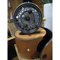 A Hardy, The Silex Major bate casting reel in a leather case