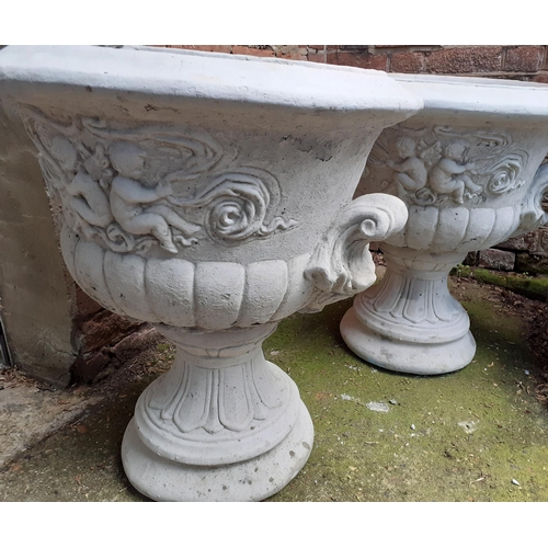 6 - A pair of garden urns decorated in cherubs, 65cm h x 55cm circumference, Location: FOYER