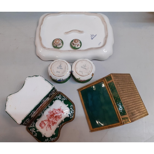 13 - A Dresdon desk set with two ink wells, a gilded and green enamelled cigarette case and an enamelled ... 