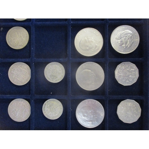 56 - A coin collection of mainly British and commemorative coinage to include two shilling and half crown... 