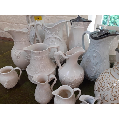 60 - Victorian and other relief pattern jugs to include T&R Boote examples, W.B Cobridge
Location: FSL