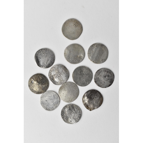 49 - William III (1694-1702) a small group of twelve silver six pence in various conditions