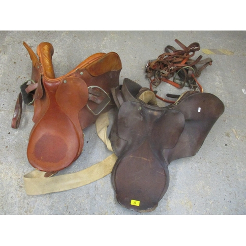 28 - Two leather horse saddles and tack, Location: G