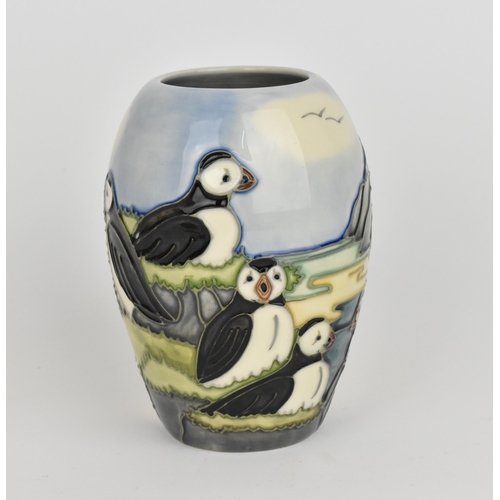 19 - A Moorcroft pottery 'Puffin' pattern baluster vase designed by Carol Lovett, 1997, with impressed ma... 