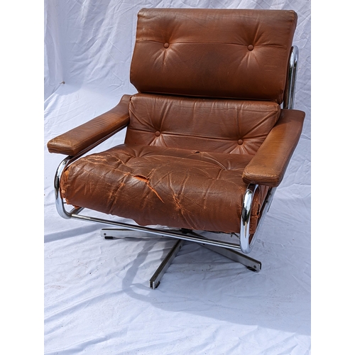 30 - A 1970s Tim Bates for Pieff tan leather and chrome Alpha lounge chair, with button back rest and sea... 