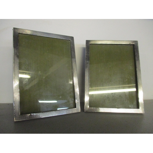 25 - A pair of early 20th Century Silver photo Frames
Location: SILVER TRAY