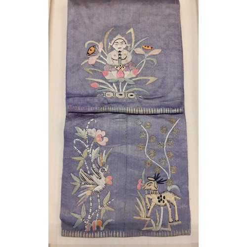 19 - An early 20th Century blue silk double sided purse, embroidered with pink flower, bat and melon, mou... 