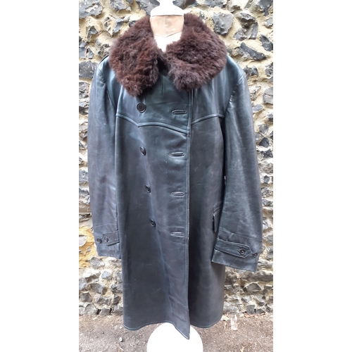 30 - German Uniform - German Officers overcoat. Black leather with utility buttons and brown fur lined co... 