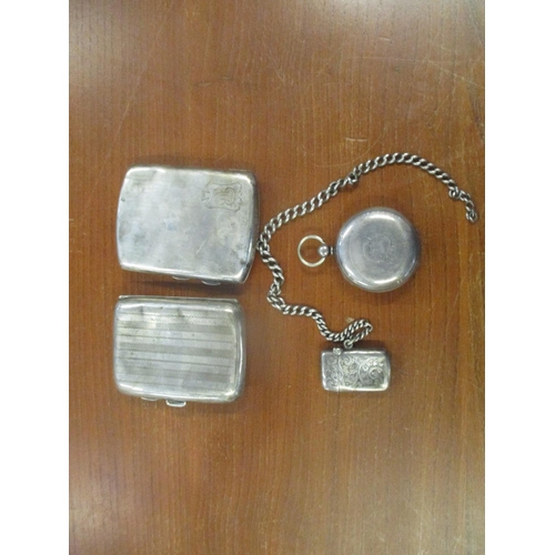 11 - Two silver cigarette cases, a silver watch chain, a miniature silver vesta vase and a silver pocket ... 