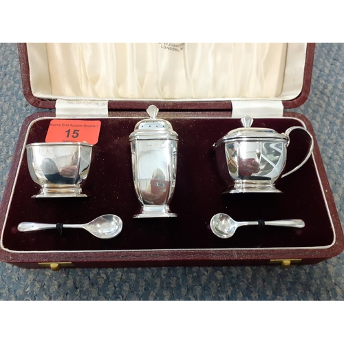 15 - A 1960's Birmingham silver cruet set, makers name H. Perovetz, total weight without blue glass liner... 
