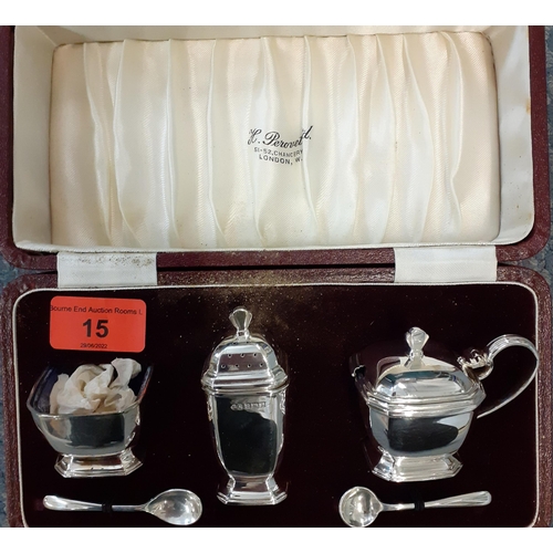 15 - A 1960's Birmingham silver cruet set, makers name H. Perovetz, total weight without blue glass liner... 
