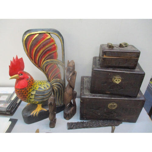 27 - A selection of treen to include Chinese carved boxes, a large cockerel and others, together with mix... 