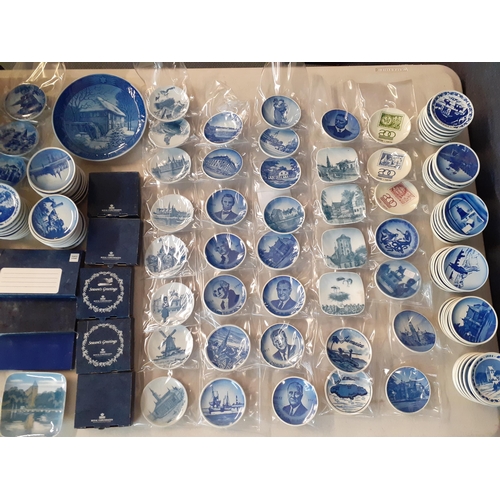 11 - A large collection of Royal Copenhagen porcelain mini plates, with date books, and Christmas plates ... 