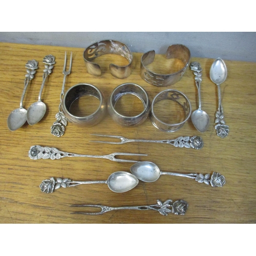20 - Mixed silver and white metal to include a set of continental 800 silver spoons and forks, 108.2g
Loc... 