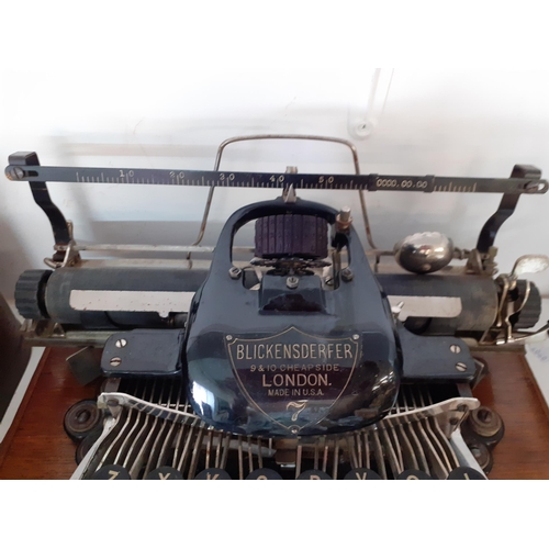 13 - Circa 1900's, an oak cased Blickensderfer typewriter A/F
Condition: the leather handle to the front ... 
