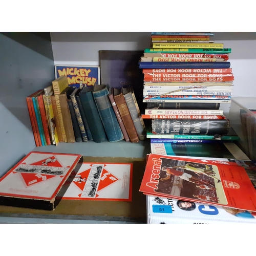 51 - A quantity of 20th Century books to include annuals and Ladybird books together with vintage Monopol... 