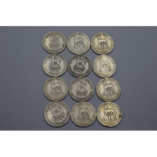 7 - Twelve George V Silver One Shillings 1920, 1921 (x4), 1922 (x2), 1928, 1930, 1932, 1934, 1935