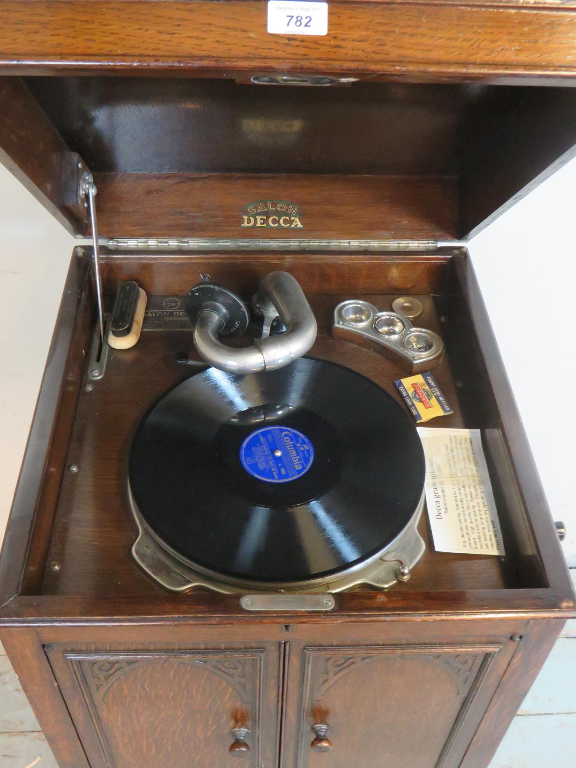 A 1920's oak cased freestanding Decca Salon Model 70 gramophone with ...