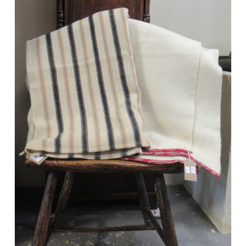16 - Two antique narrow loom Welsh woollen blankets; one with a narrow alternating black and light brown ... 