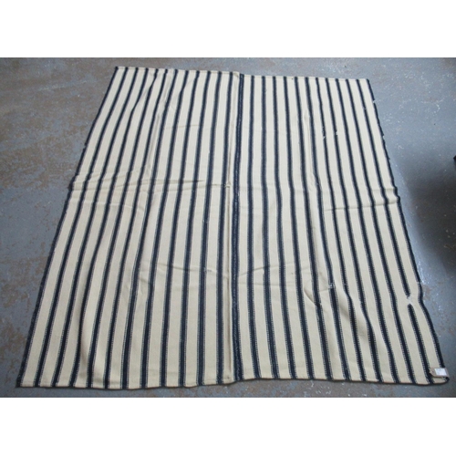 26 - Two antique narrow loom Welsh woollen blankets; one with a wide black stripe and the other a smaller... 