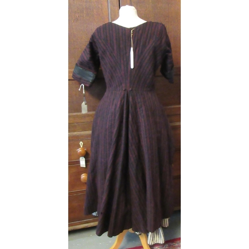 31 - 19th Century traditional woollen Welsh costume to include; white and black striped skirt, a black an... 