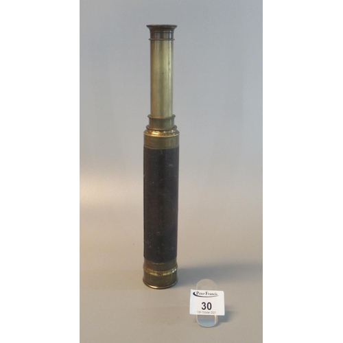 30 - Early 20th Century brass two draw telescope with leather covering. 22.5cm long minimum.
(B.P. 21% + ... 
